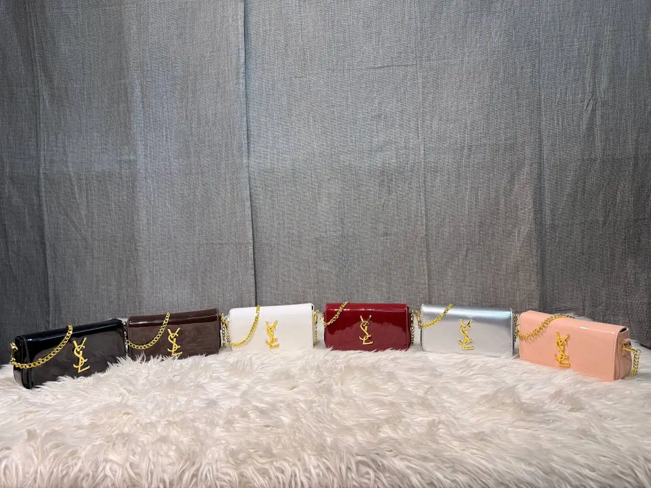 Luxury patent leather chain clutch bag for women with glossy finish and gold strap