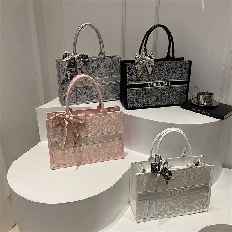 Fashionable women tote bag with floral pattern and chic scarf detail