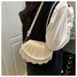 Trendy Shell Shape Pearl Handbag for Women – Stylish Crossbody & Shoulder Mini Bag (Pink, Brown, Cream, Black) - Image 11