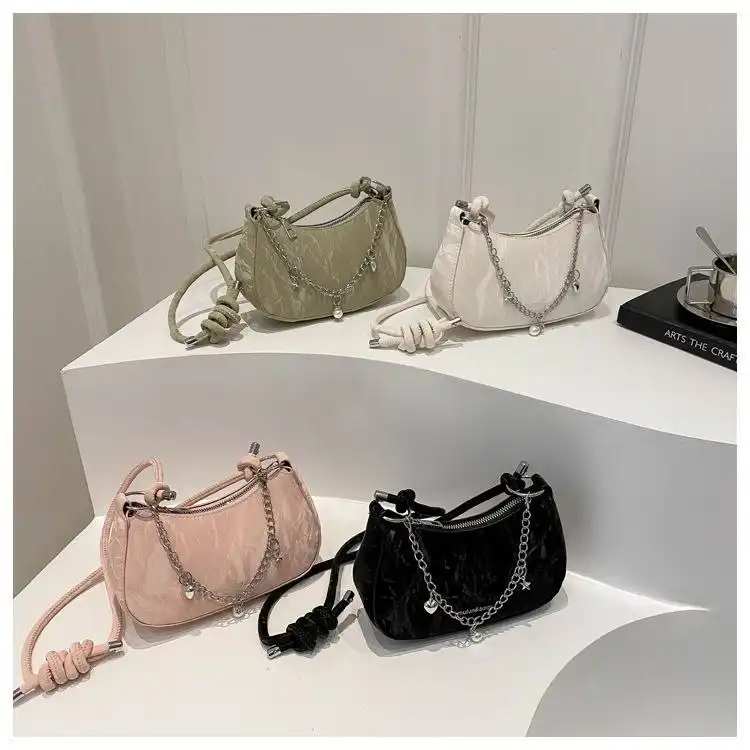Trendy mini shoulder bag for women with chain detail and glossy finish Trendy mini shoulder bag for women with chain detail and glossy finish