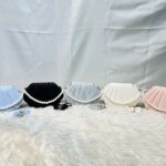Elegant shell shape pearl handbag for women with pleated design and pearl chain strap