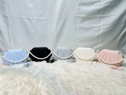 Elegant shell shape pearl handbag for women with pleated design and pearl chain strap