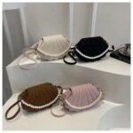 Trendy shell shape pearl handbag for women with pleated design and pearl chain strap