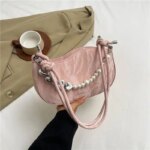 Stylish white mini handbag with pearl and metallic chain detail