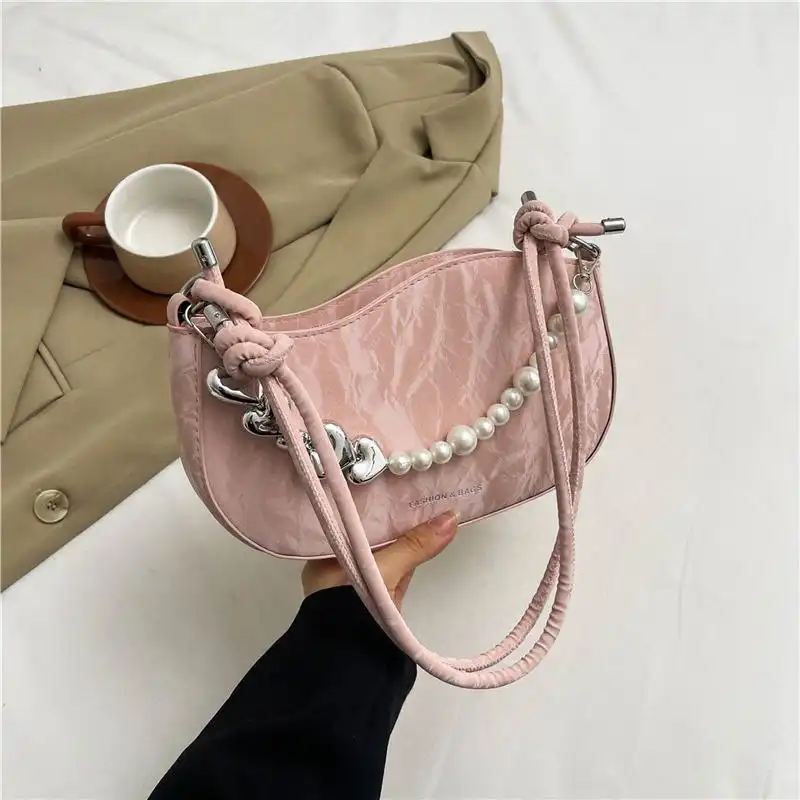 Stylish white mini handbag with pearl and metallic chain detail